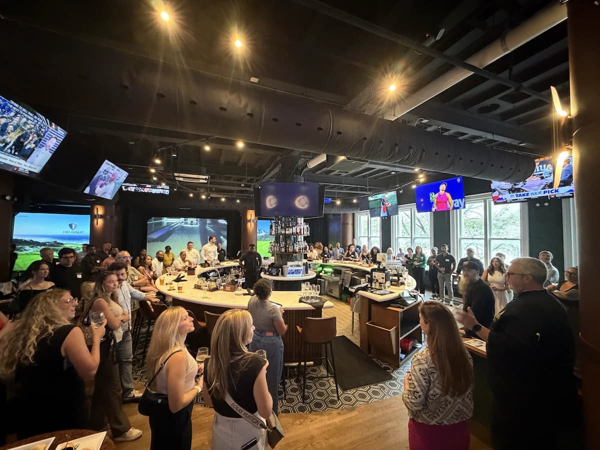 A packed room at Accelerate Atlanta at Peachtree Sporting Club